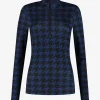 Aansluitende top met rits en logo patroon