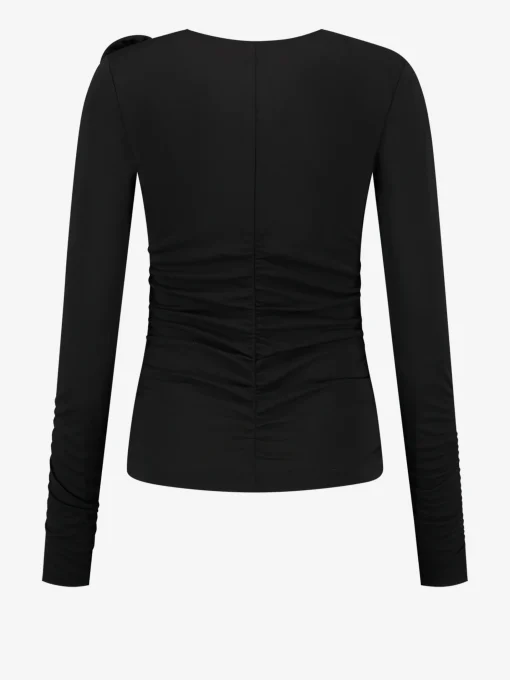 Gedrapeerde top met bloem detail