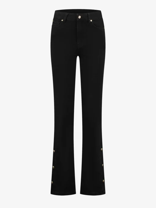 High rise flared jeans met knopen