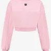 Korte sweater met metalen logo
