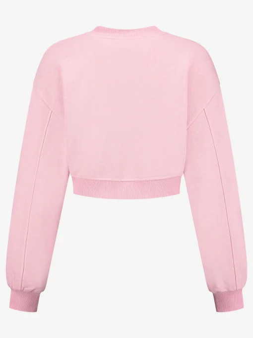 Korte sweater met metalen logo
