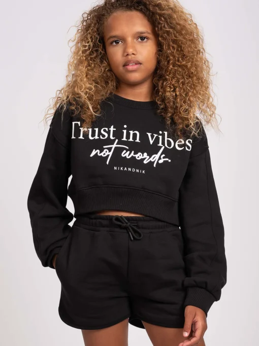 Korte sweater met tekst