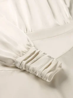Overslag jurk met satijnen look