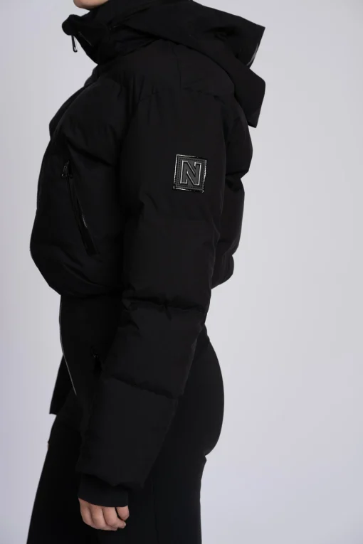 Ski jumpsuit met waterdichte bescherming en verstelbare details