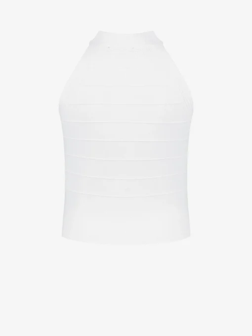 Top met N-logo knopen