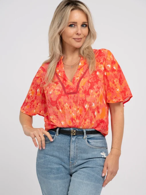Top met ruffles
