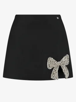 Aansluitende skort met glitter strik
