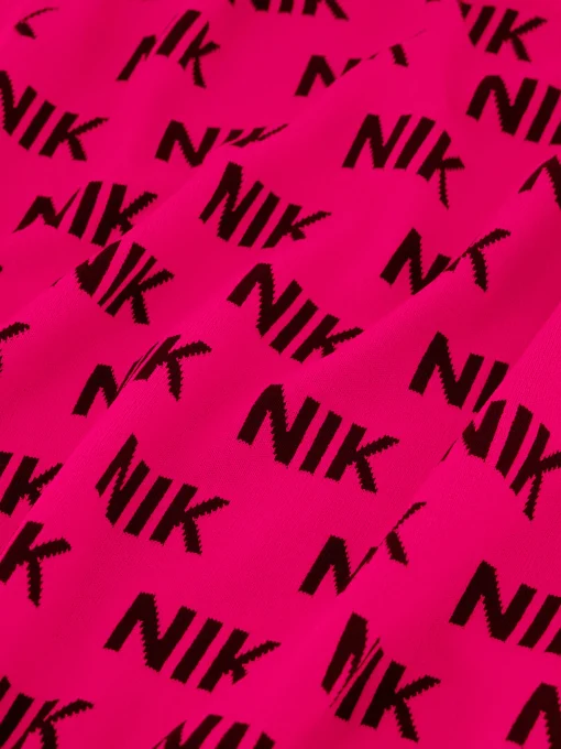 Aansluitende trui met NIK&NIK logo patroon