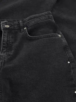 Flared jeans met studs aan zijkant