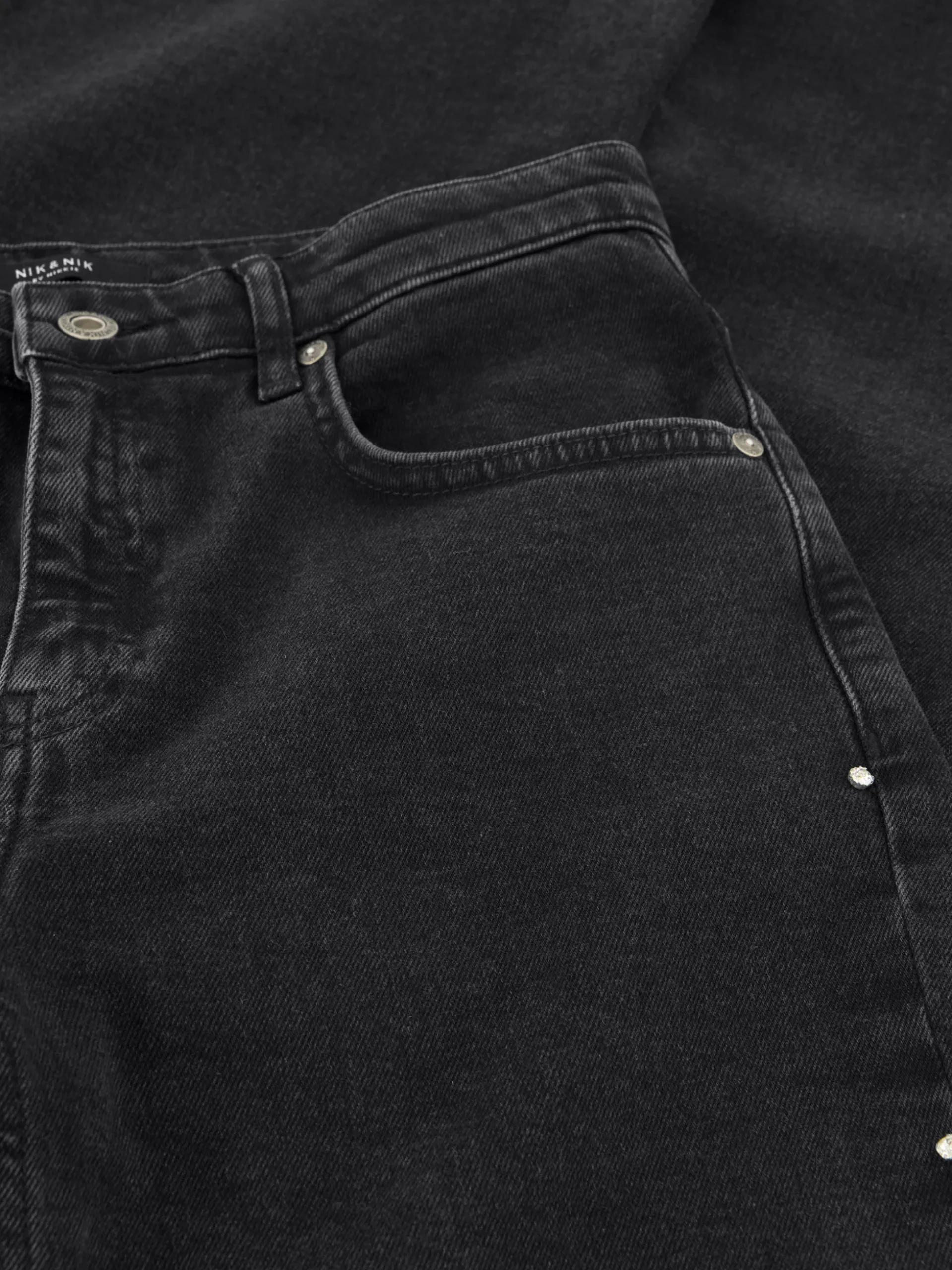 Flared jeans met studs aan zijkant