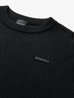 Geribbelde trui met logo