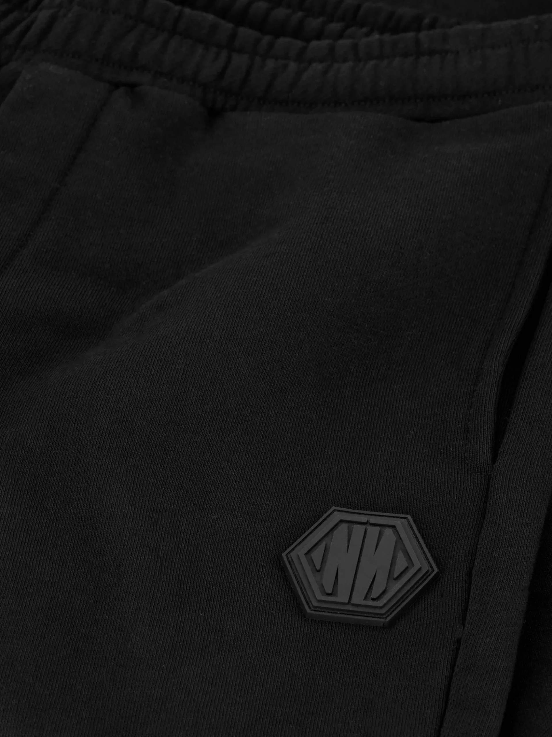 Losvallende joggingbroek met logo patch