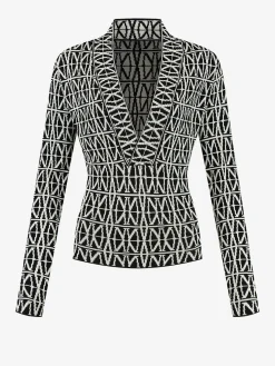 Top met logo patroon