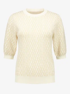 Top met logo patroon